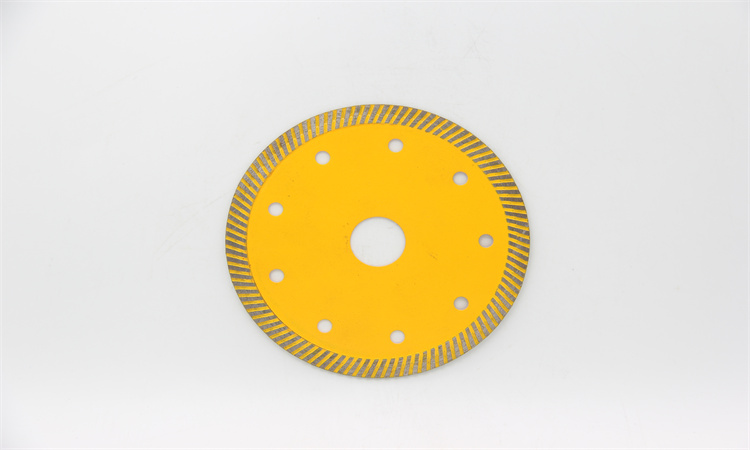 Yellow patterned-rim diamond blade