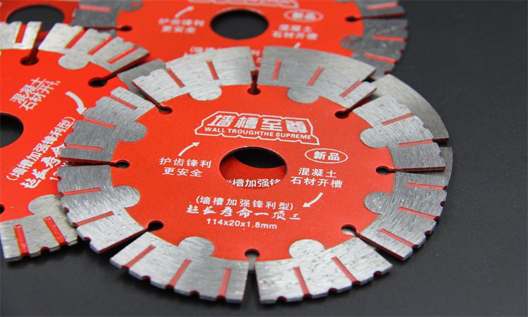Red segmented diamond blade in front of other blades
