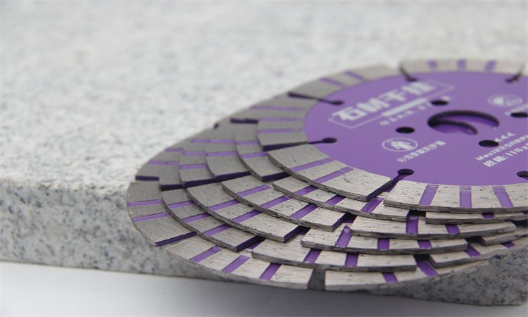 Stack of purple diamond blades with patterned rims