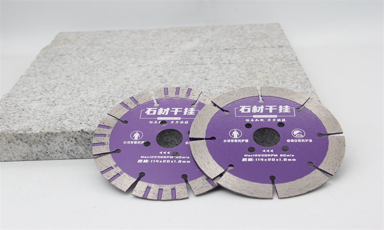 Two purple diamond blades with different rim patterns