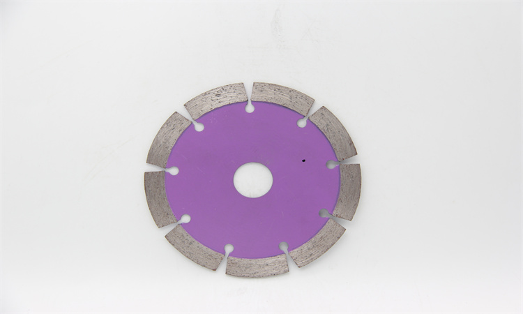 Purple segmented diamond blade on a white background