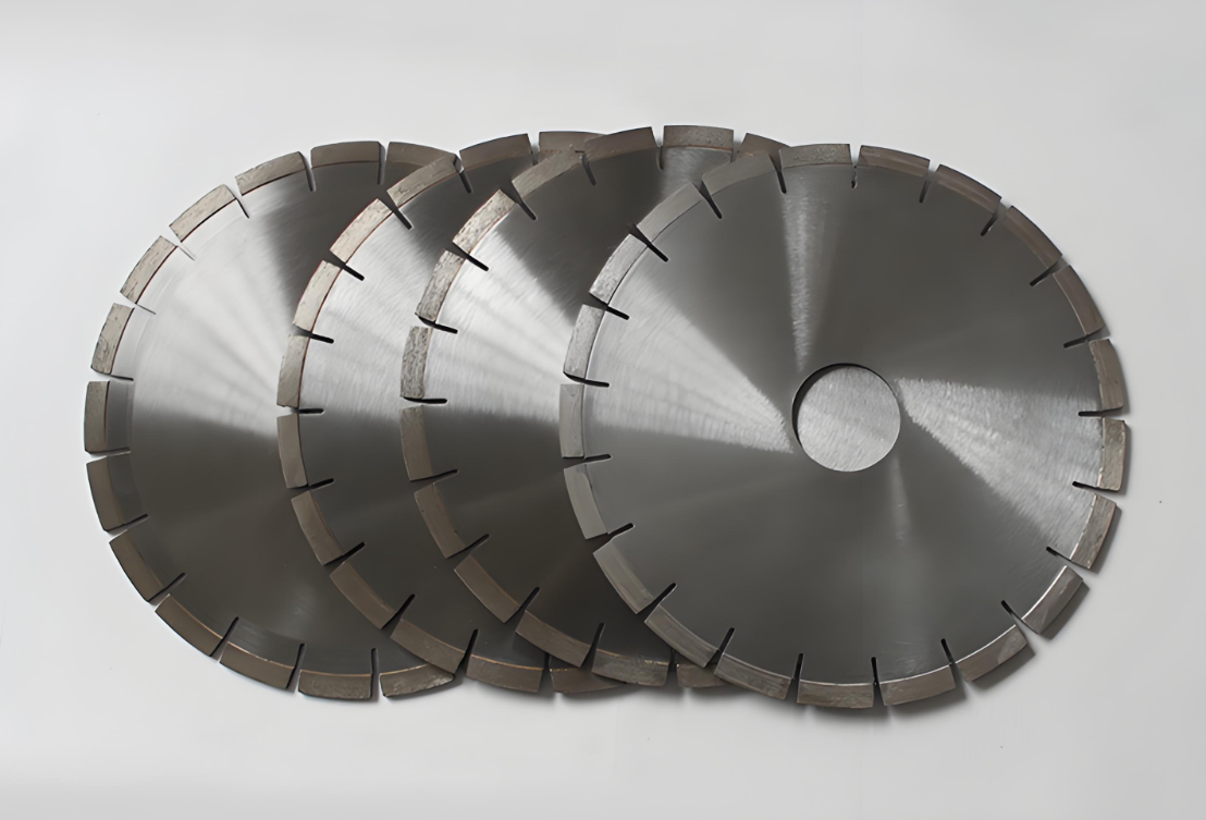 Three silver segmented diamond saw blades